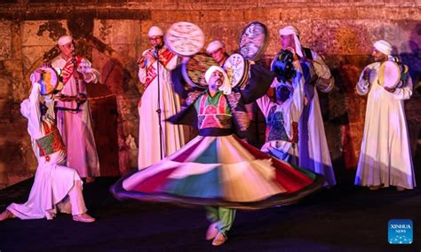 Quing-tastic Cairo Carnival: A Celebration of Music, Dance, and a Touch of Egyptian Mysticism!